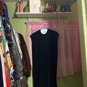 Black Eileen Fisher sweater dress with cap sleeves can be below belted
